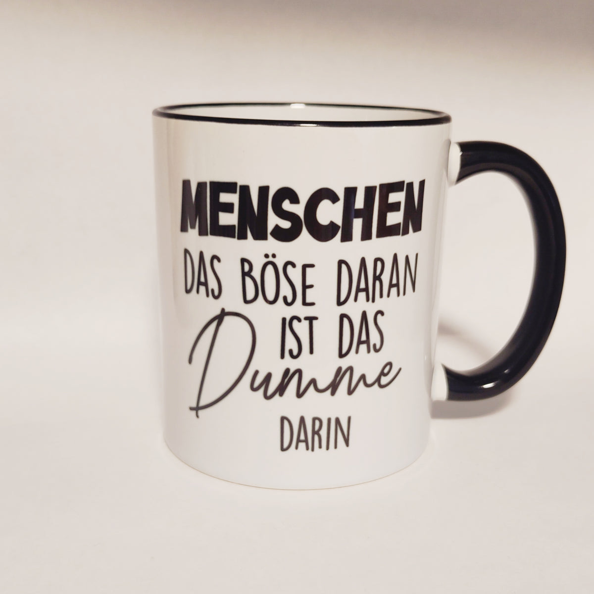 Tasse Das Dumme darin